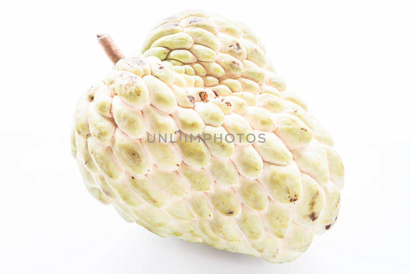 Heart shape of custard apple isolated on white background by punsayaporn