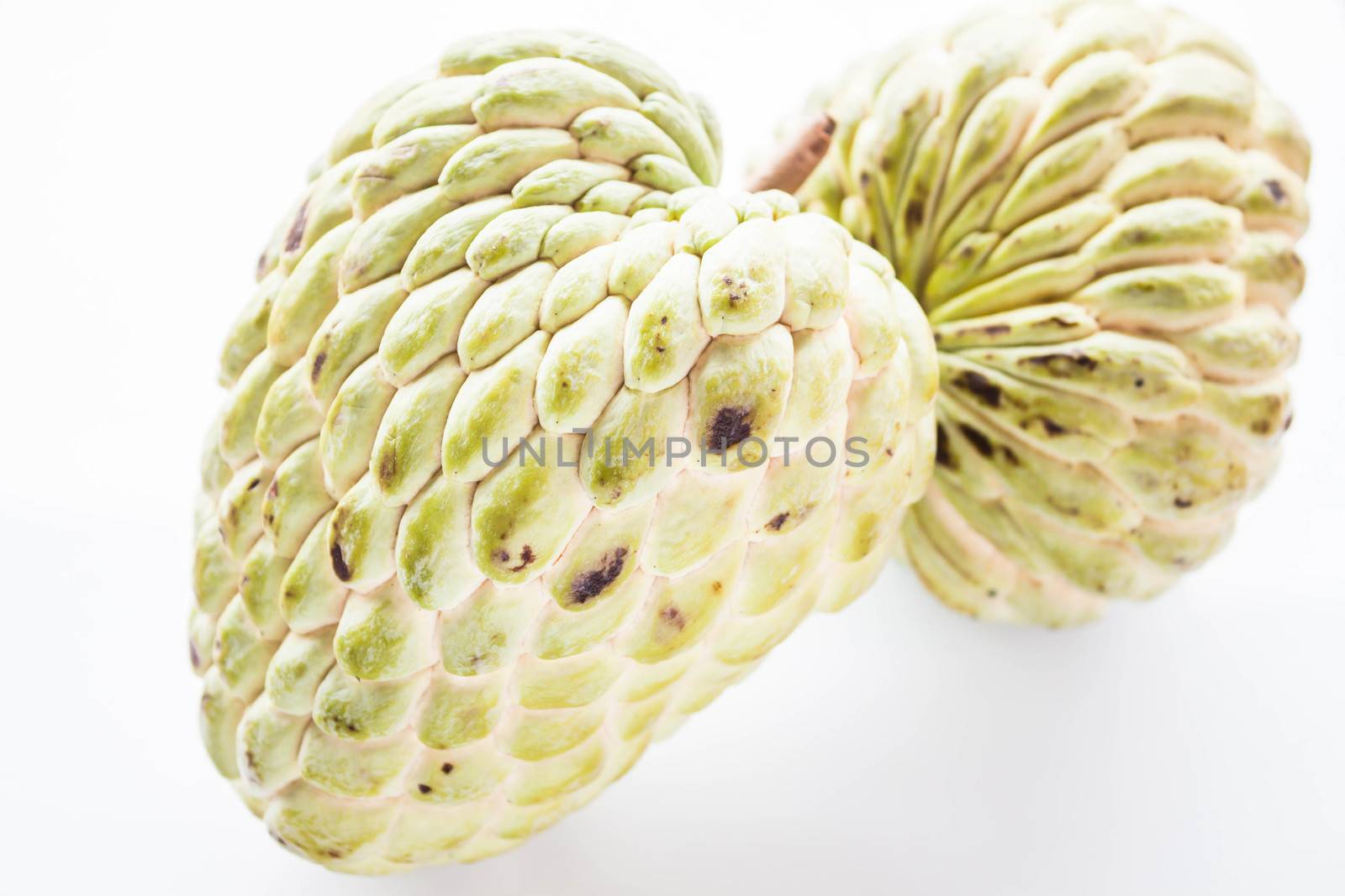 Couple fresh custard apple with geen peel