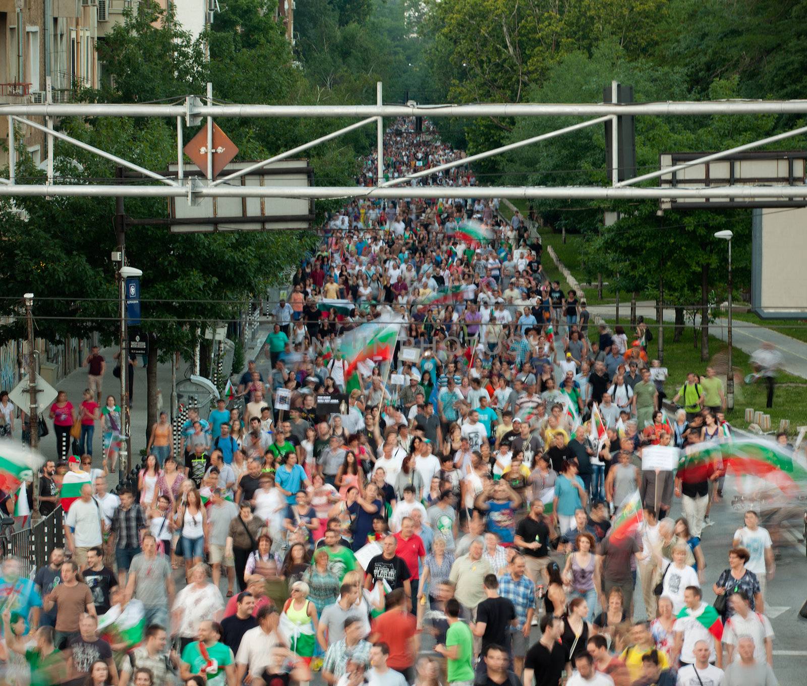 Sofia; Bulgaria - June 24, 2013: Blurred march demanding their newly appointed socialist government step down.
The protests were originally sparked by the controversial appointment of businessman and MP Delyan Peevski as the new head of the State Agency for National Security.