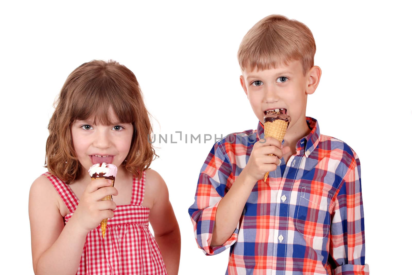 little girl and boy eat ice cream