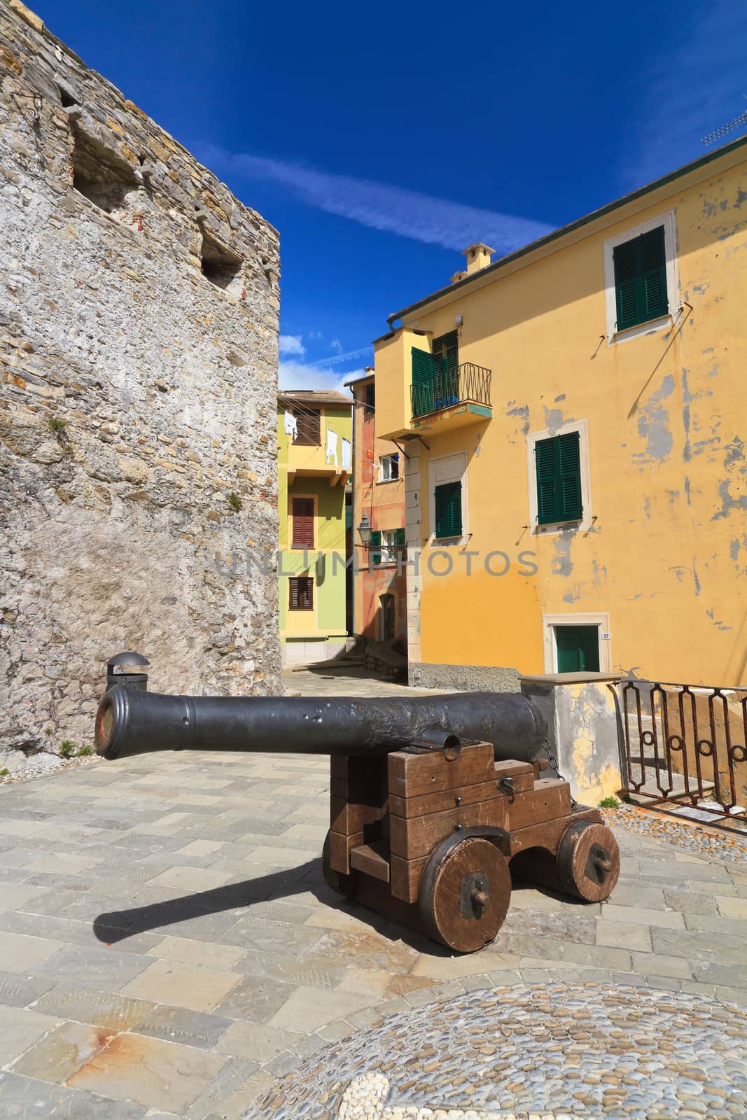 small square with an ancient cannon in Camogli, Italy