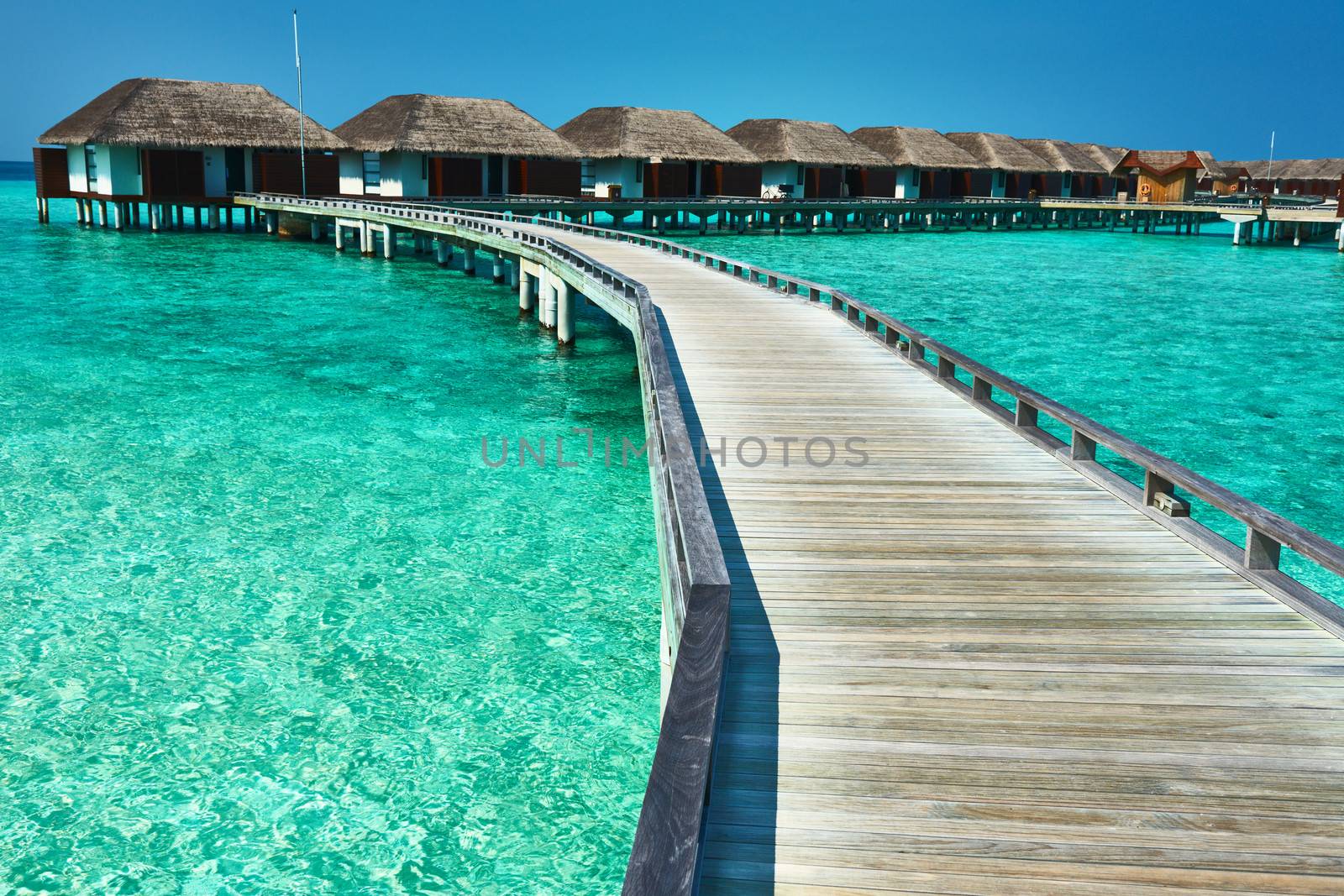 Beautiful beach with water bungalows at Maldives