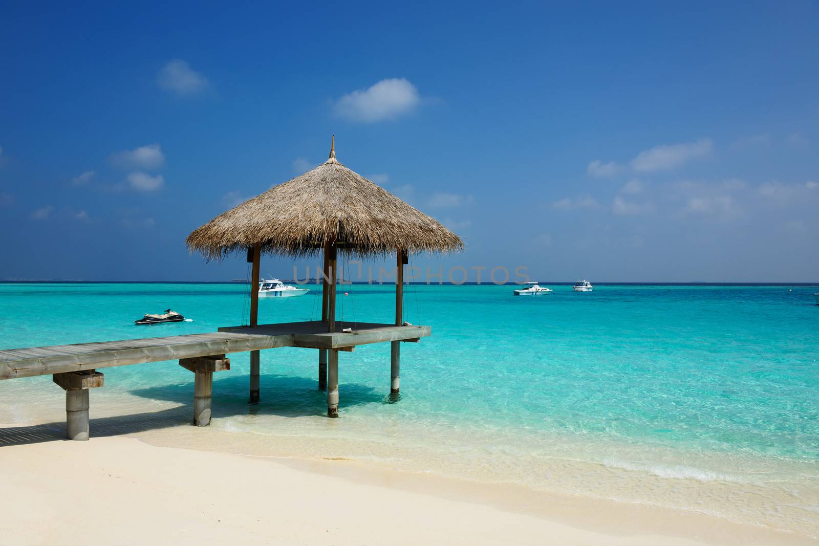 Beautiful beach with jetty at Maldives