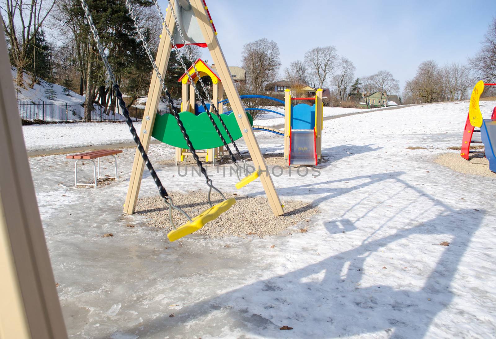 view of a colorful childrens playground in winter