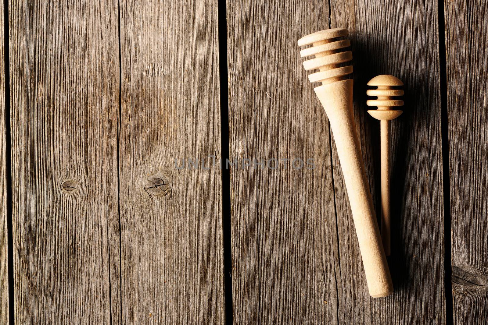 Two wooden dippers on table