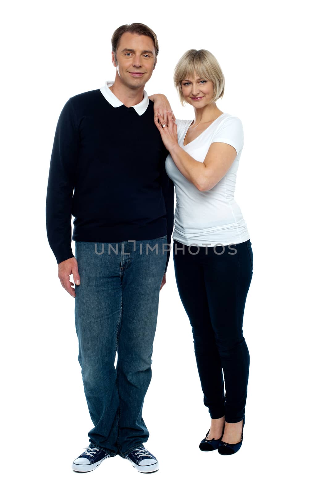 Trendy middle aged love couple by stockyimages