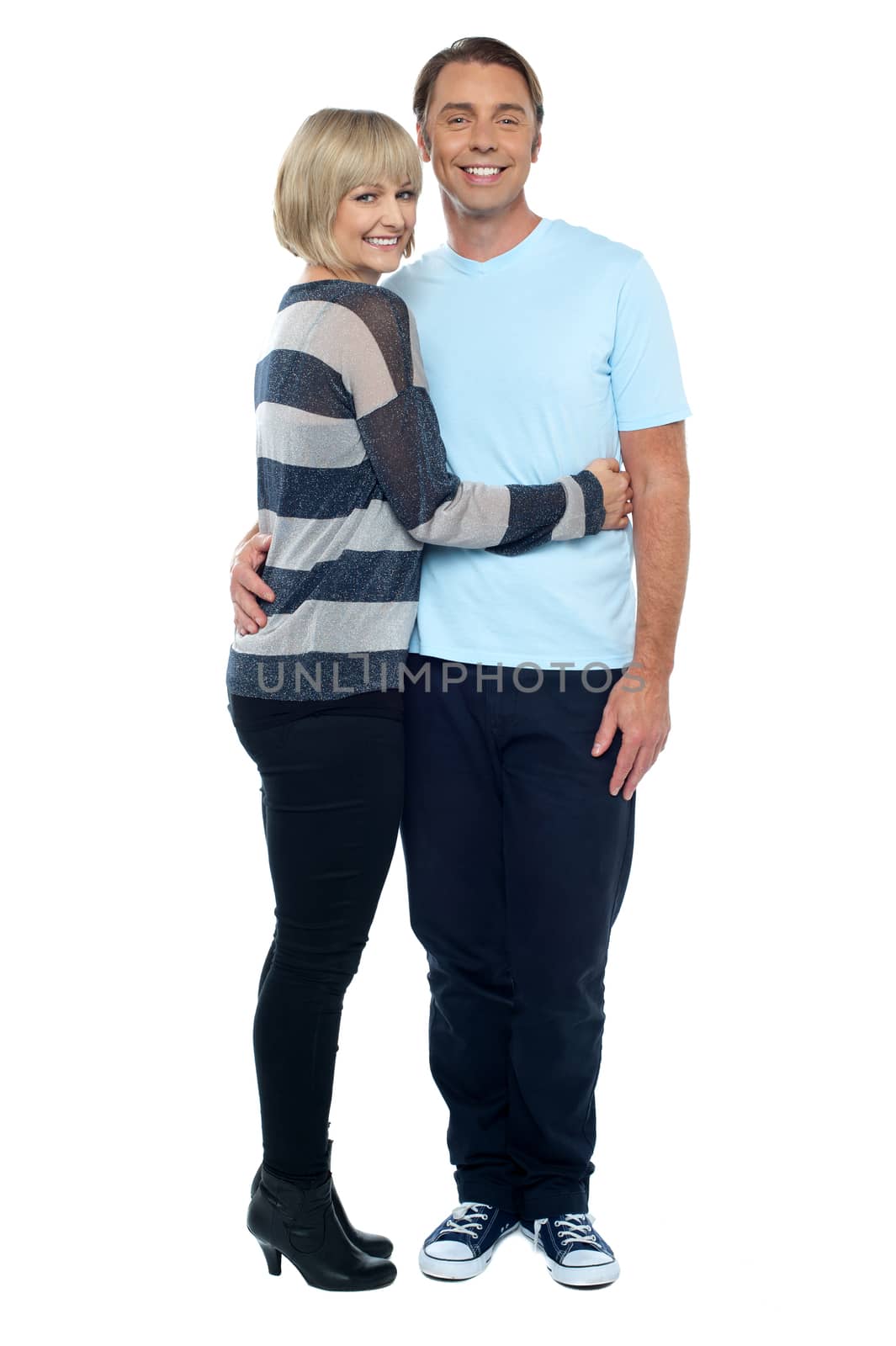 Pretty wife hugging her husband