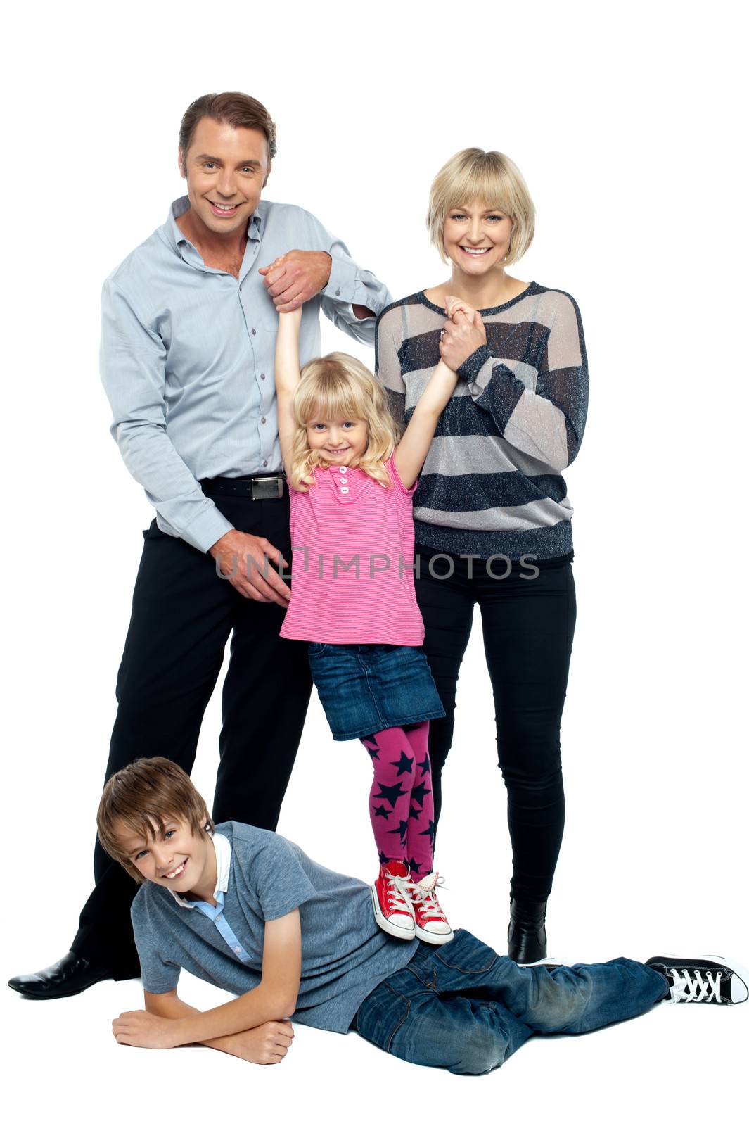 Nice family of a four having fun by stockyimages