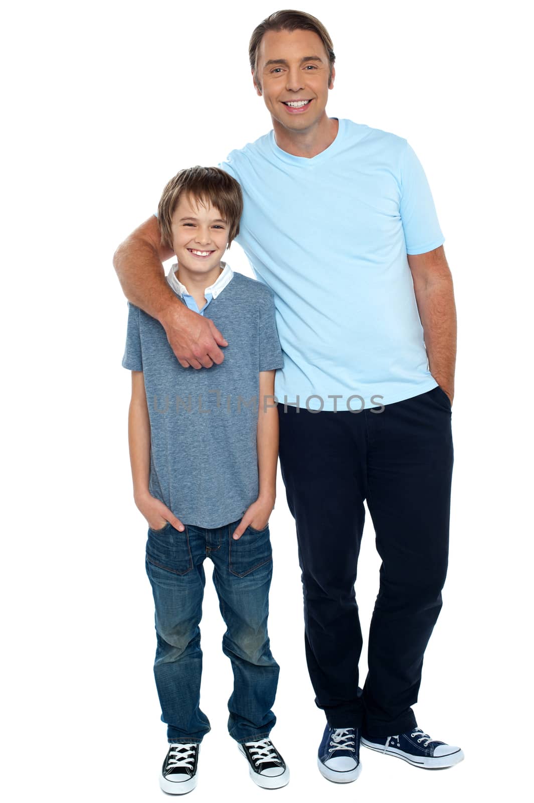 Smiling shot of a father and son by stockyimages