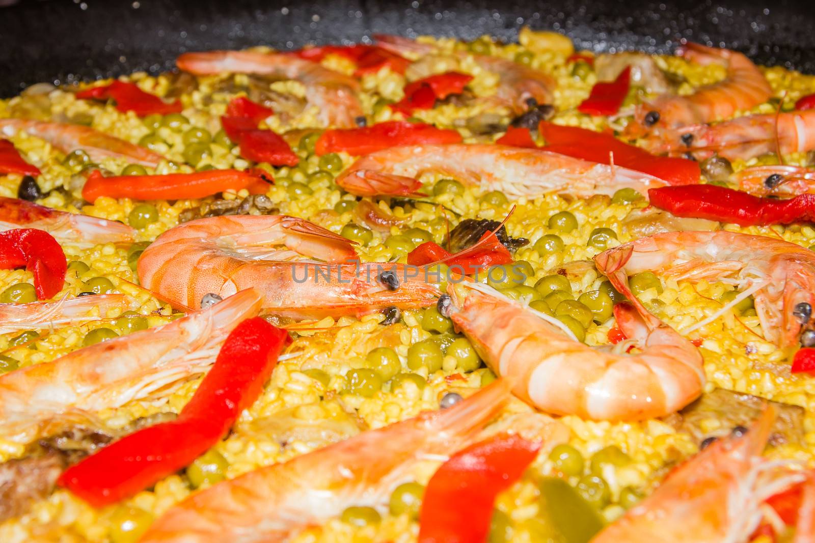 Detail of traditional spanish paella cooked in a pan by doble.d