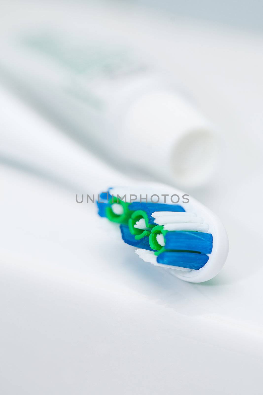 Closeup image of professional toothbrush and toothpaste in tube