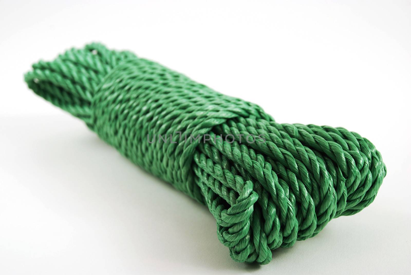 stock pictures of a coil and loop of green rope