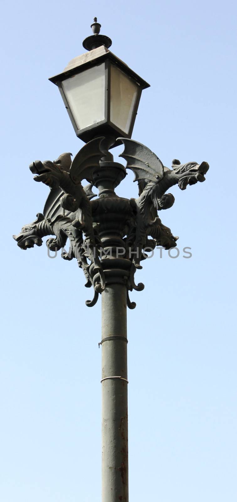 Gargoyles decorating a lamp post in Mazatlan, Mexico