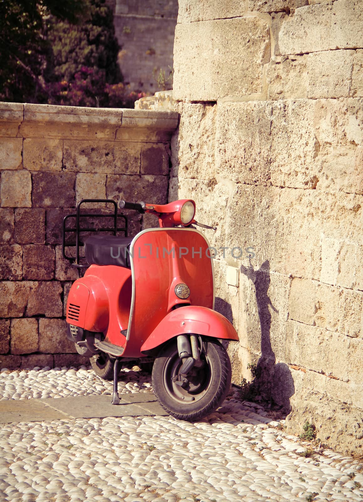 Red vintage scooter by anterovium