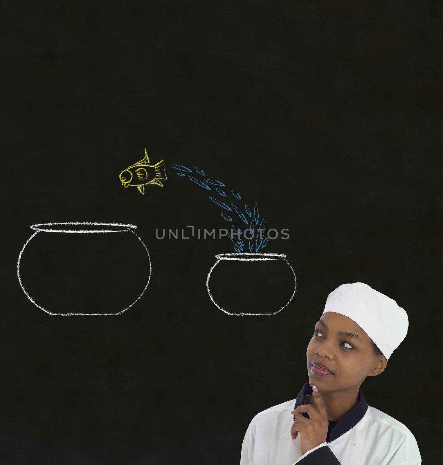 Woman female African or African American chef jumping fish decision on chalk blackboard background