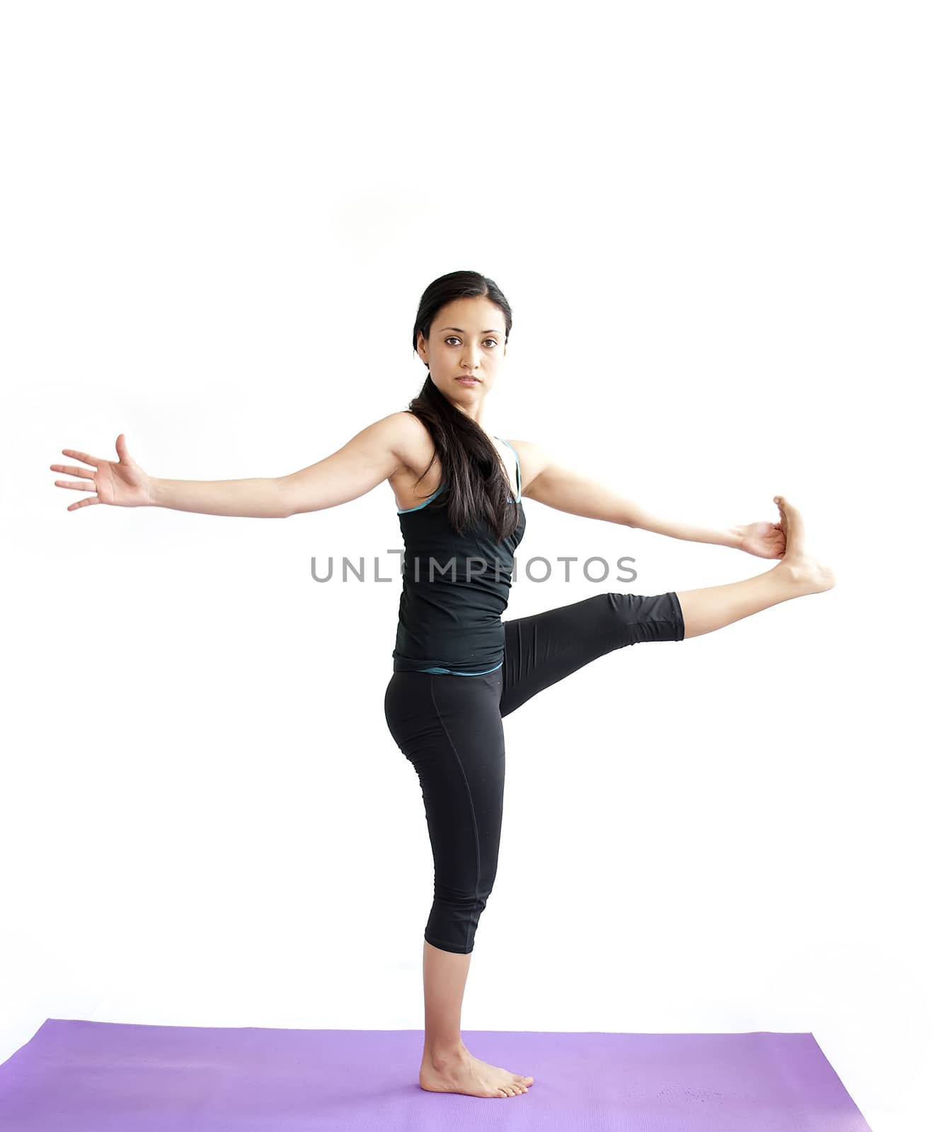 young brunette girl practising yoga isolated on white