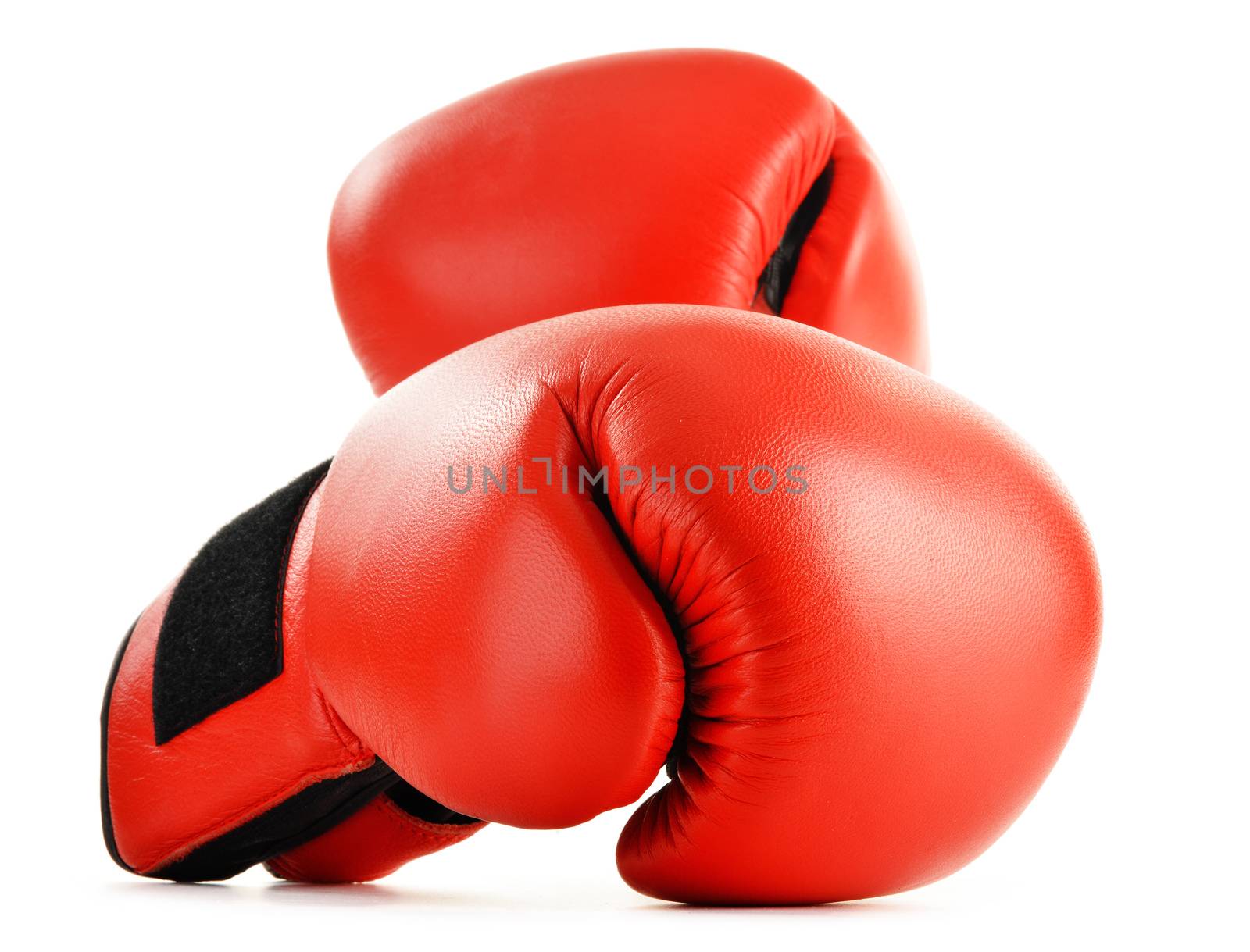 Pair of red leather boxing gloves isolated on white