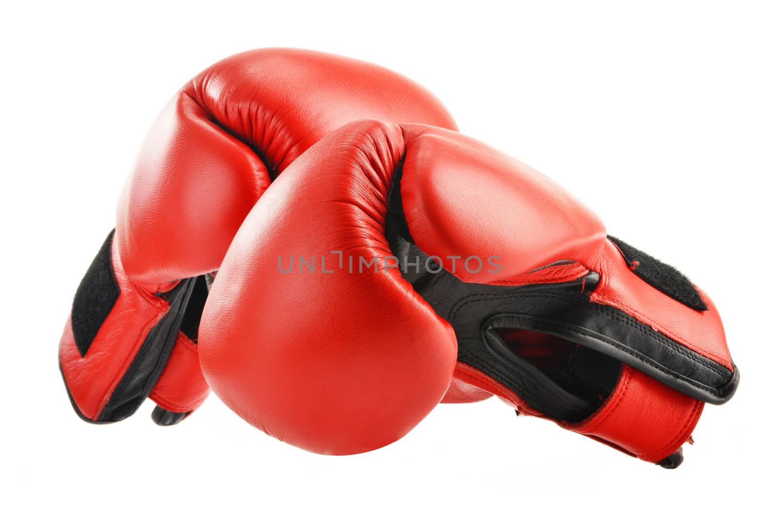 Pair of red leather boxing gloves isolated on white