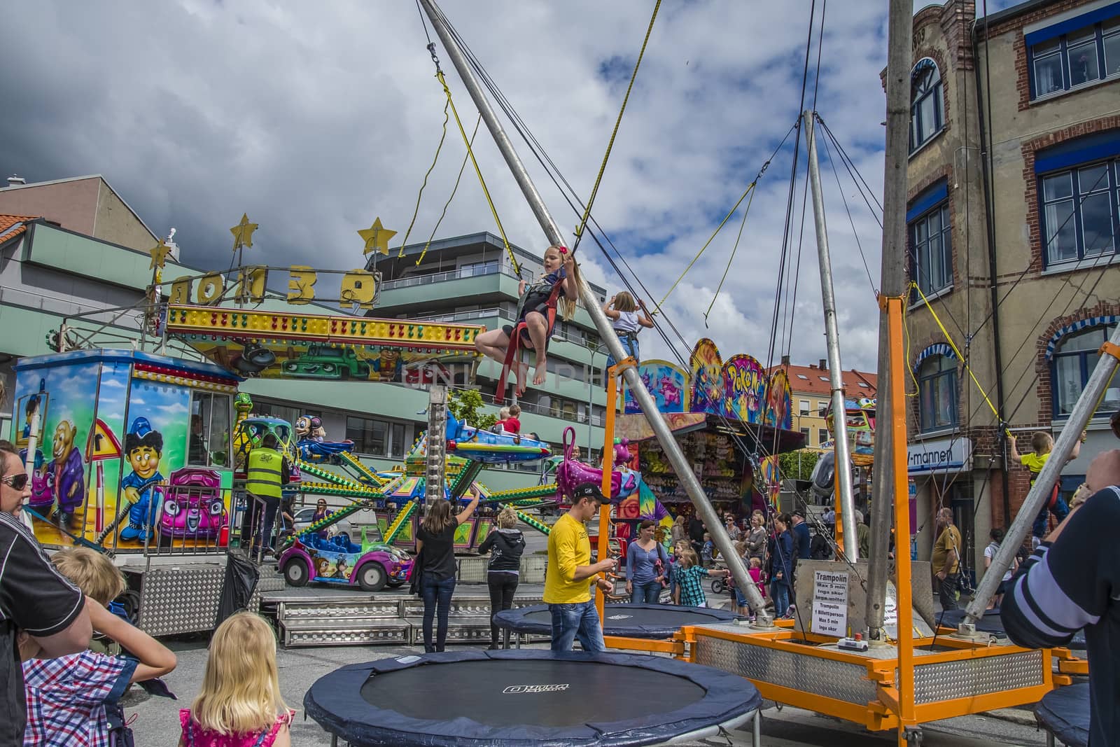 Kids have fun at the funfair on the square in Halden, Norway.