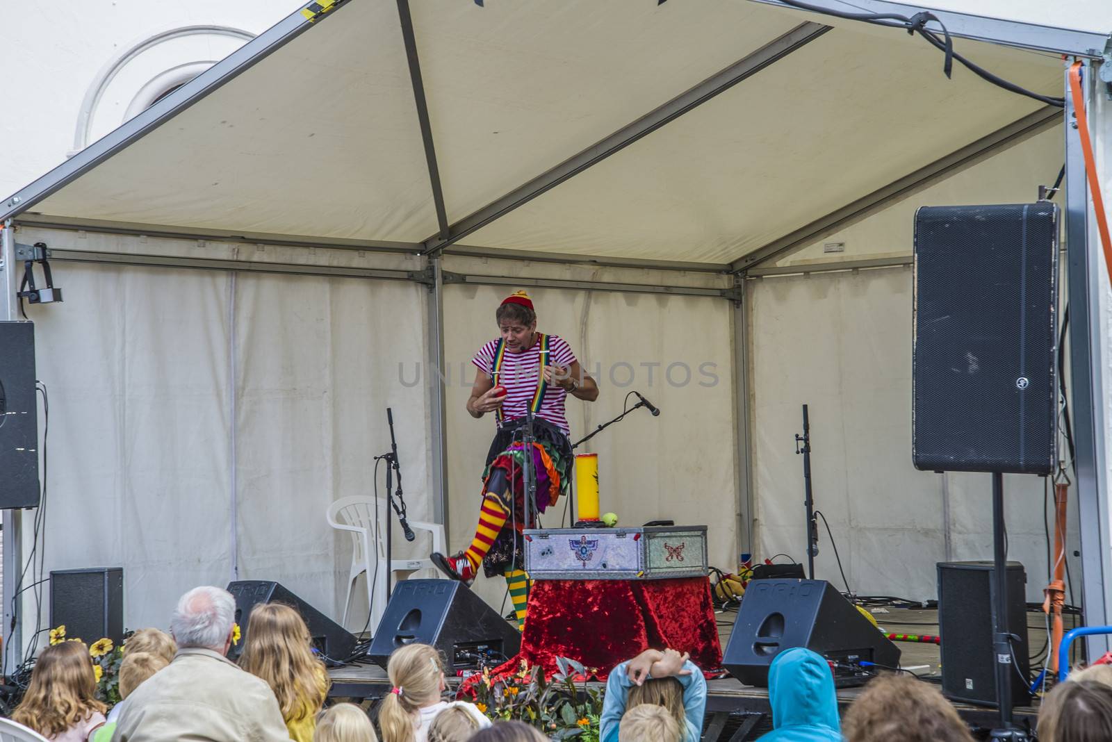 A skilled clown who entertains the kids with juggling, magic tricks and high jinks on Halden squares, Norway.