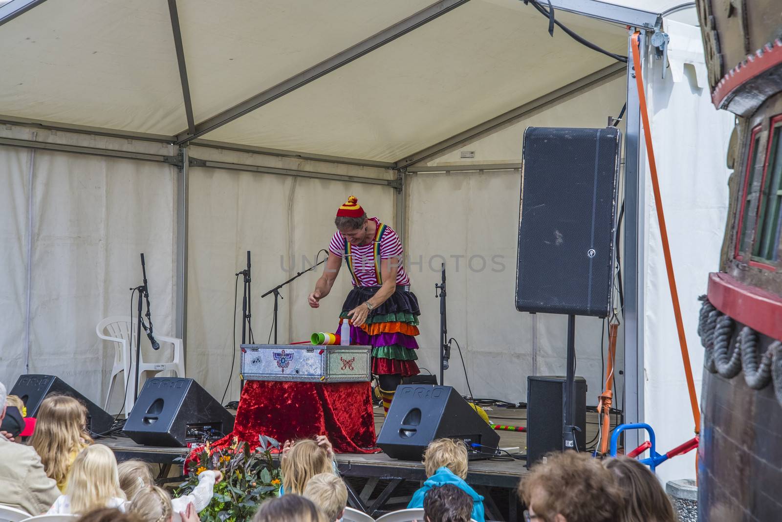 A skilled clown who entertains the kids with juggling, magic tricks and high jinks on Halden squares, Norway.