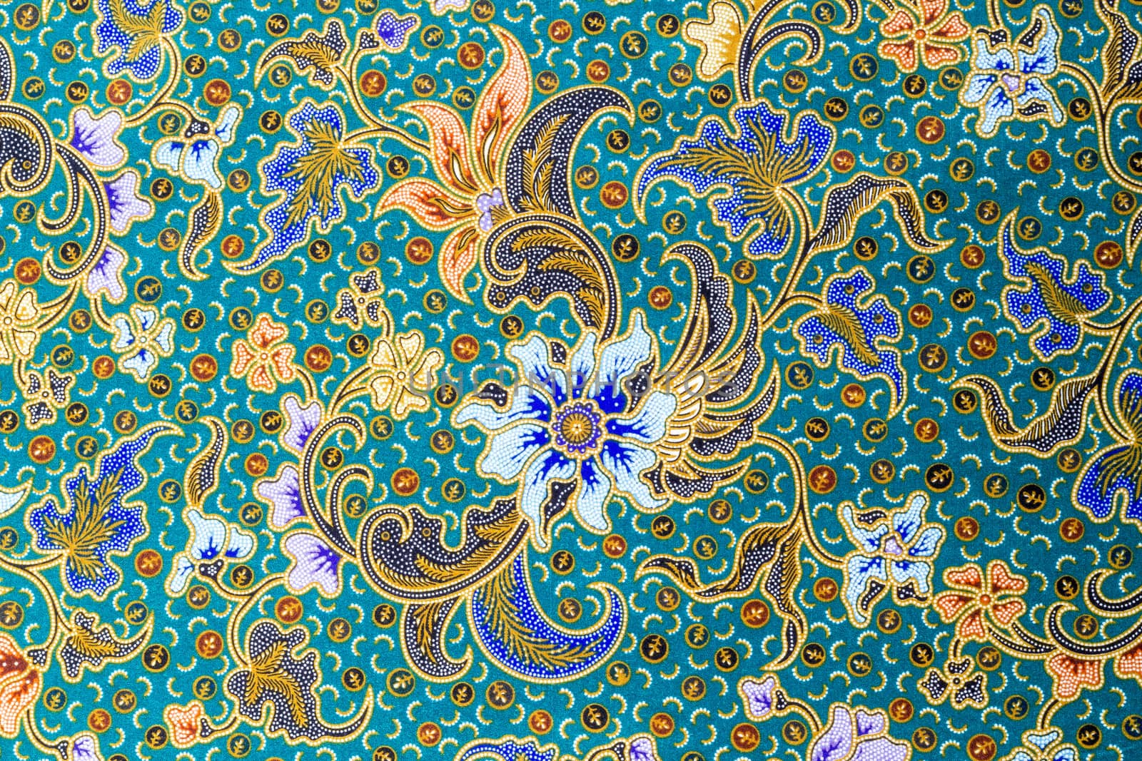 Blue flower pattern on blue fabric background