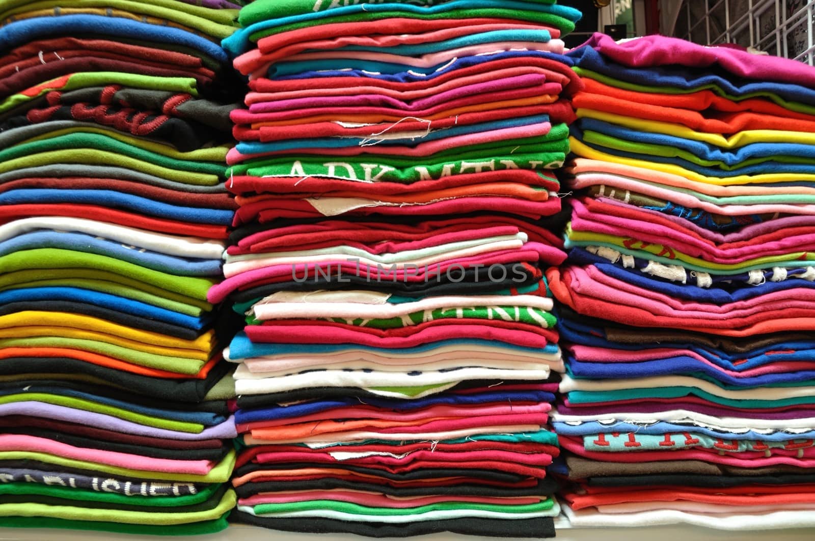 Stack of Colorful t-shirt for use as Background