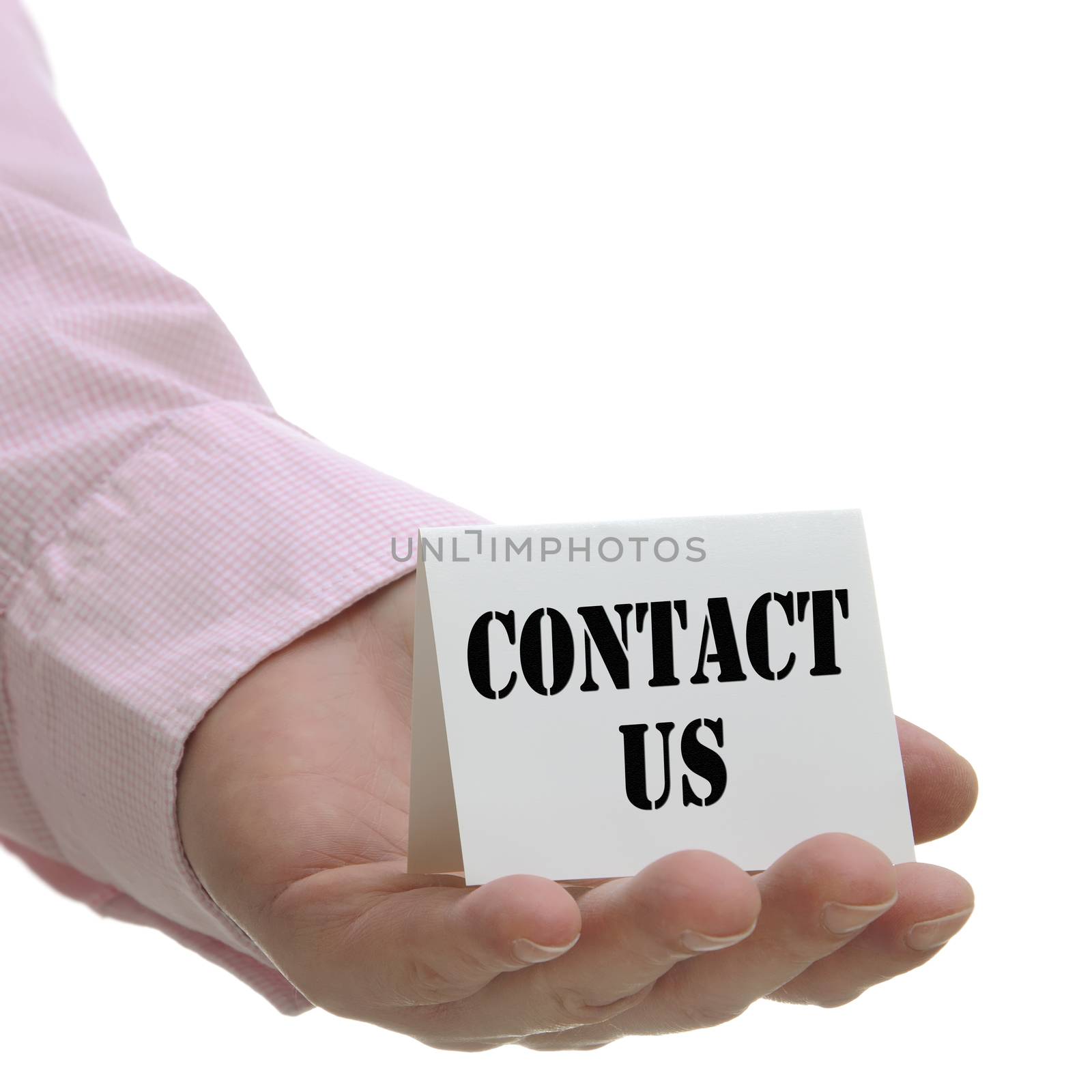 Businessman holding contact us sign with white copy space