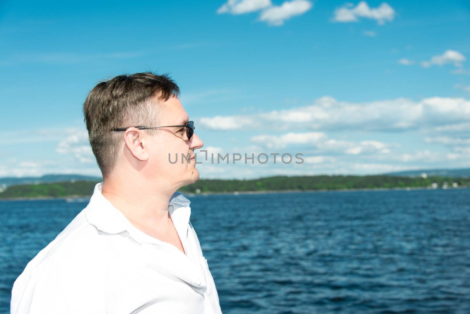Middle aged man portrait in sunglasses
