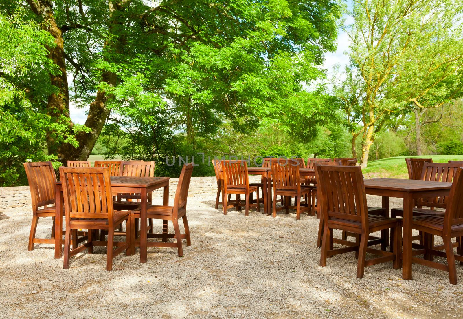 Tables and chairs of outdoor cafe in England
