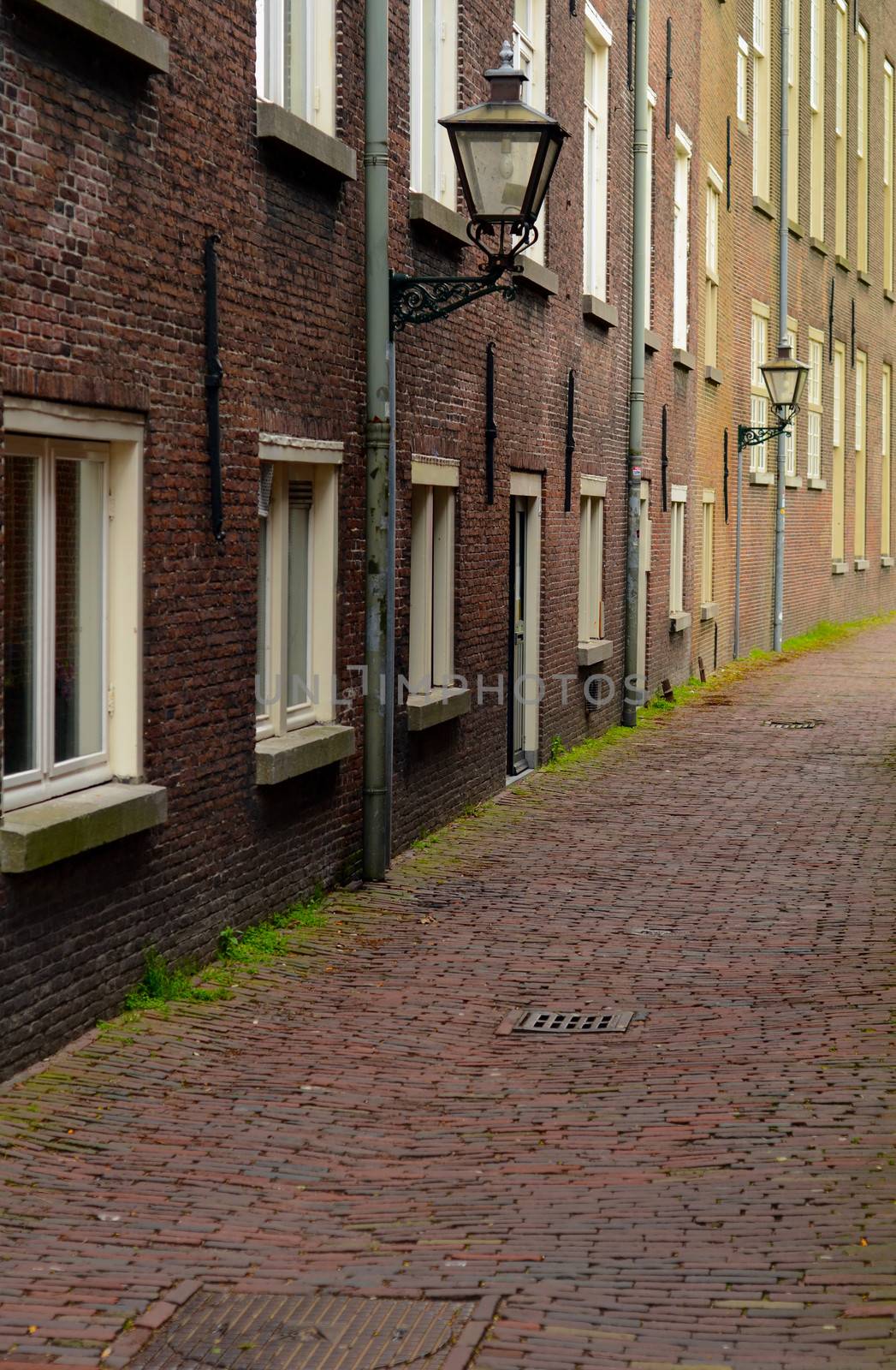 A Deserted Cobbled Backstreet In A European City