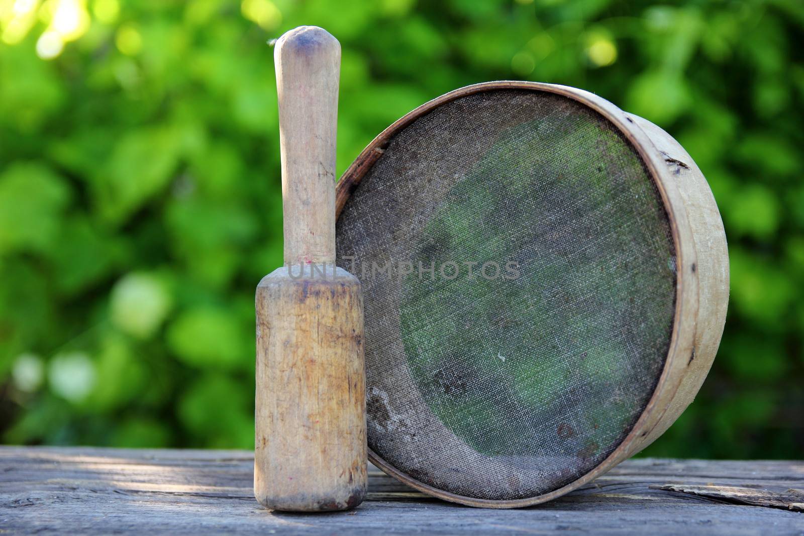 press and a flour sieve placed on the table