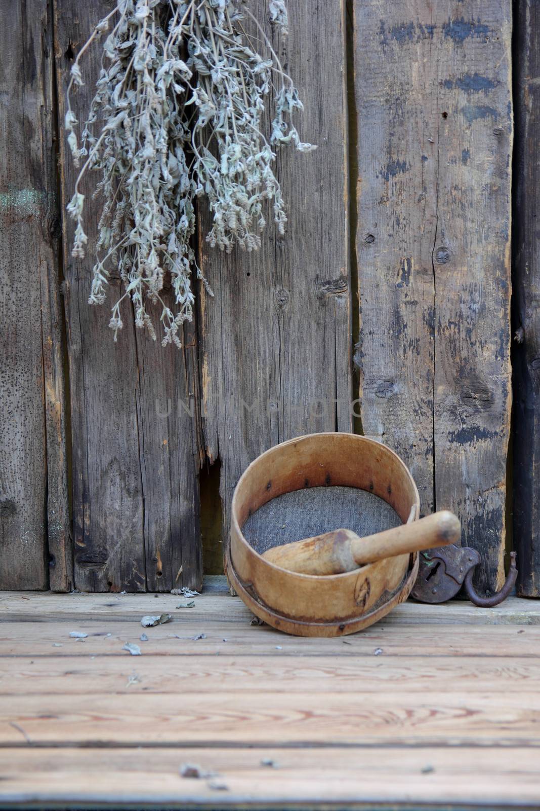 antiques: a sieve and press with the old boards