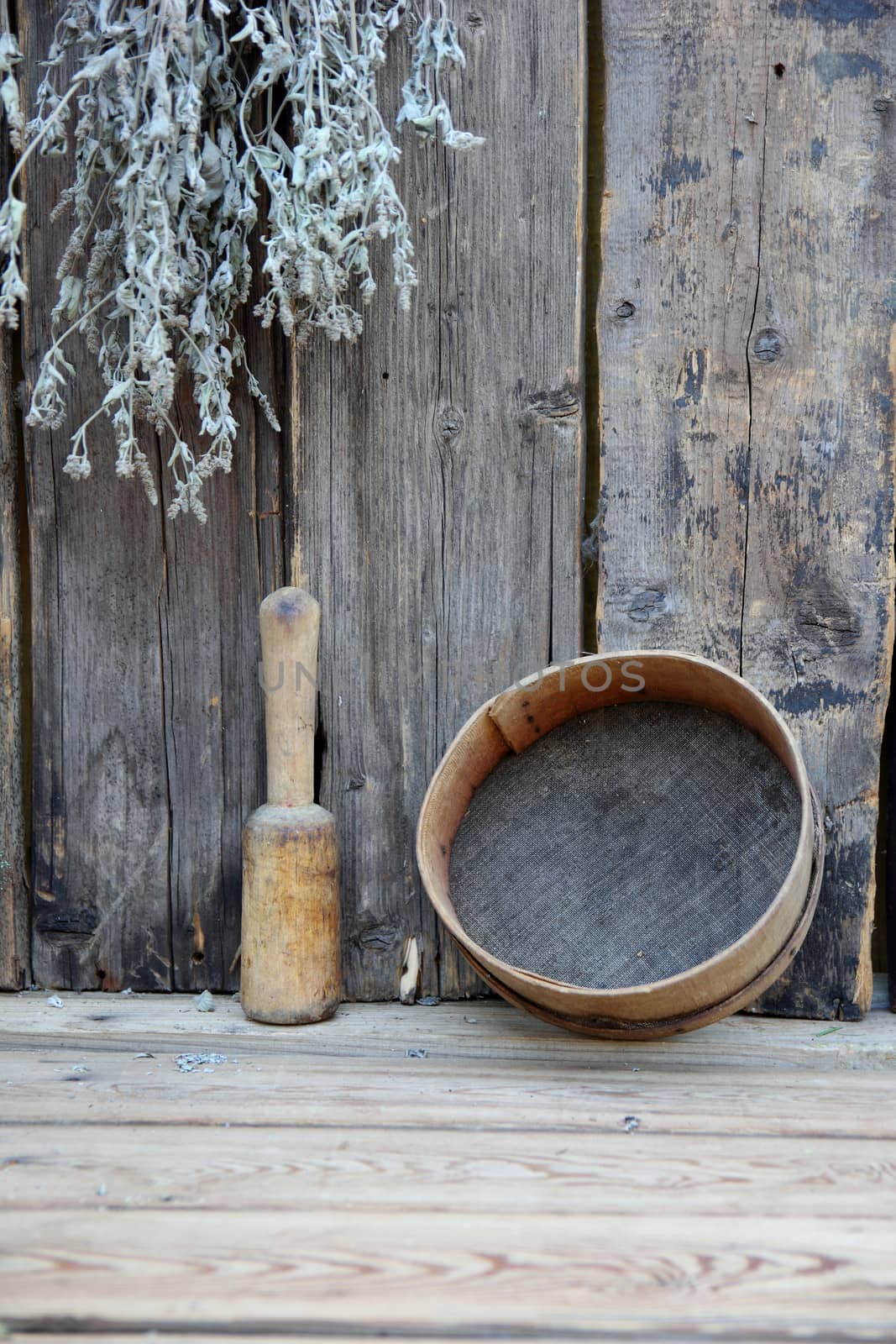 still life of an old wooden utensils and boards