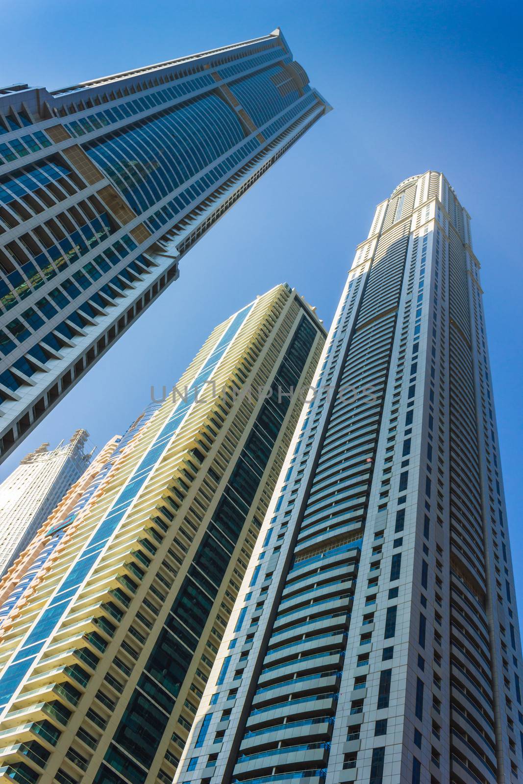 DUBAI, UAE - NOVEMBER 13: High rise buildings and streets nov 13. 2012  in Dubai, UAE. Dubai was the fastest developing city in the world between 2002 and 2008.