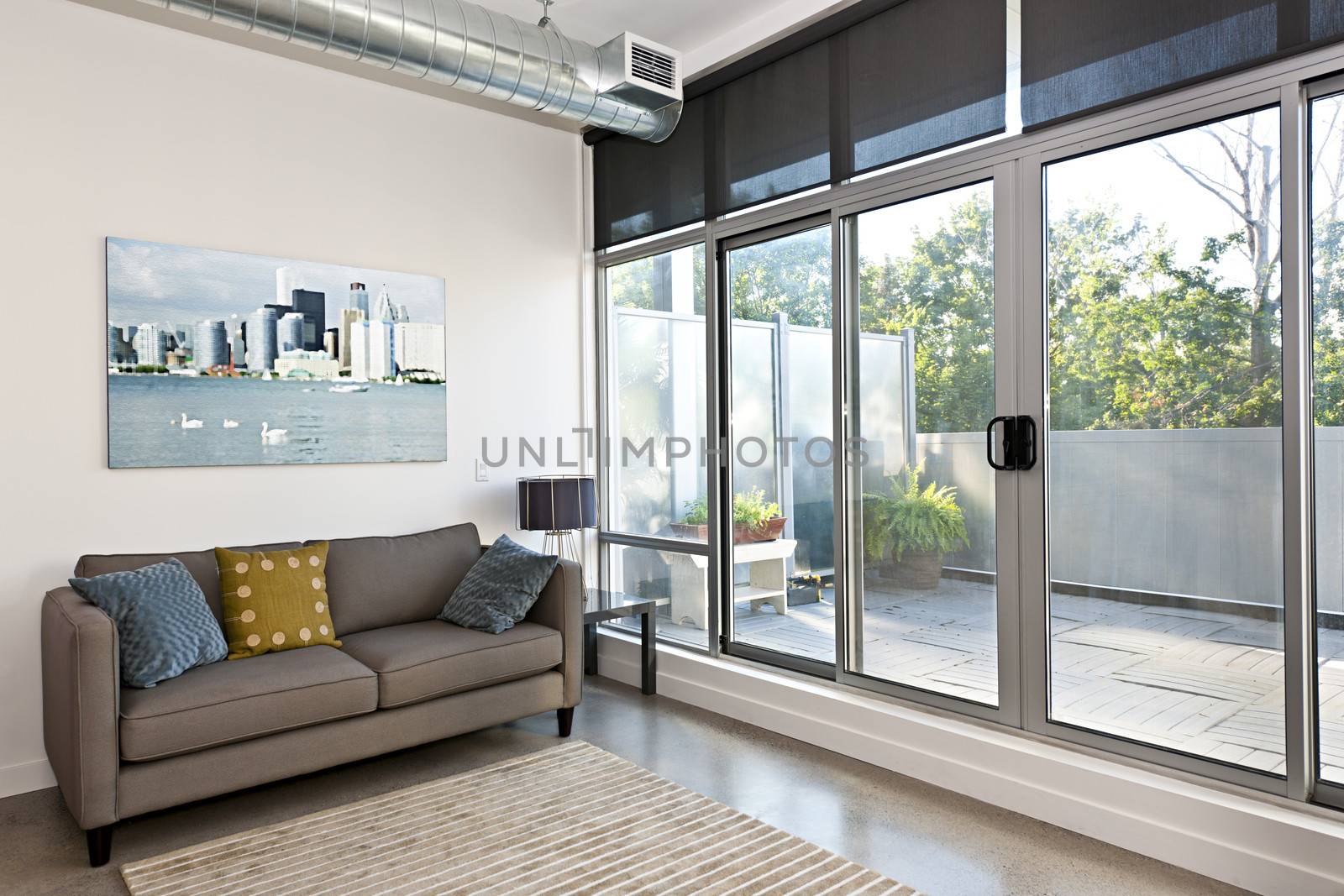 Living room with sliding glass door to balcony - artwork from photographer portfolio