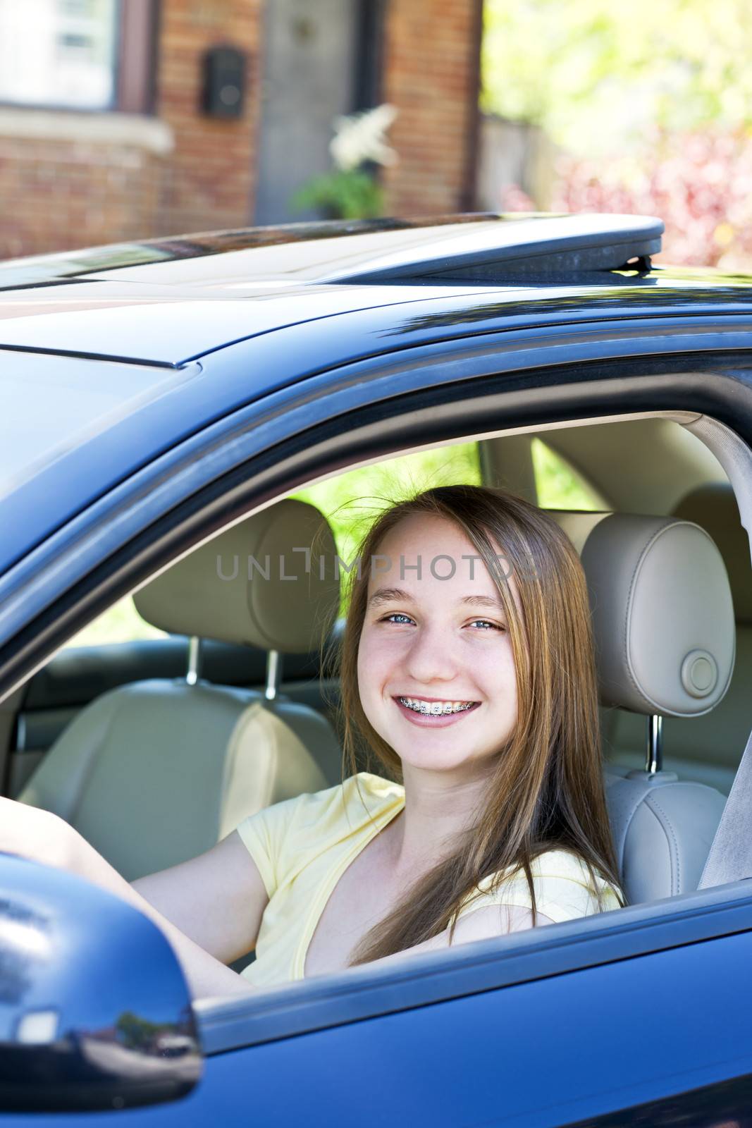 Teenage girl learning to drive by elenathewise