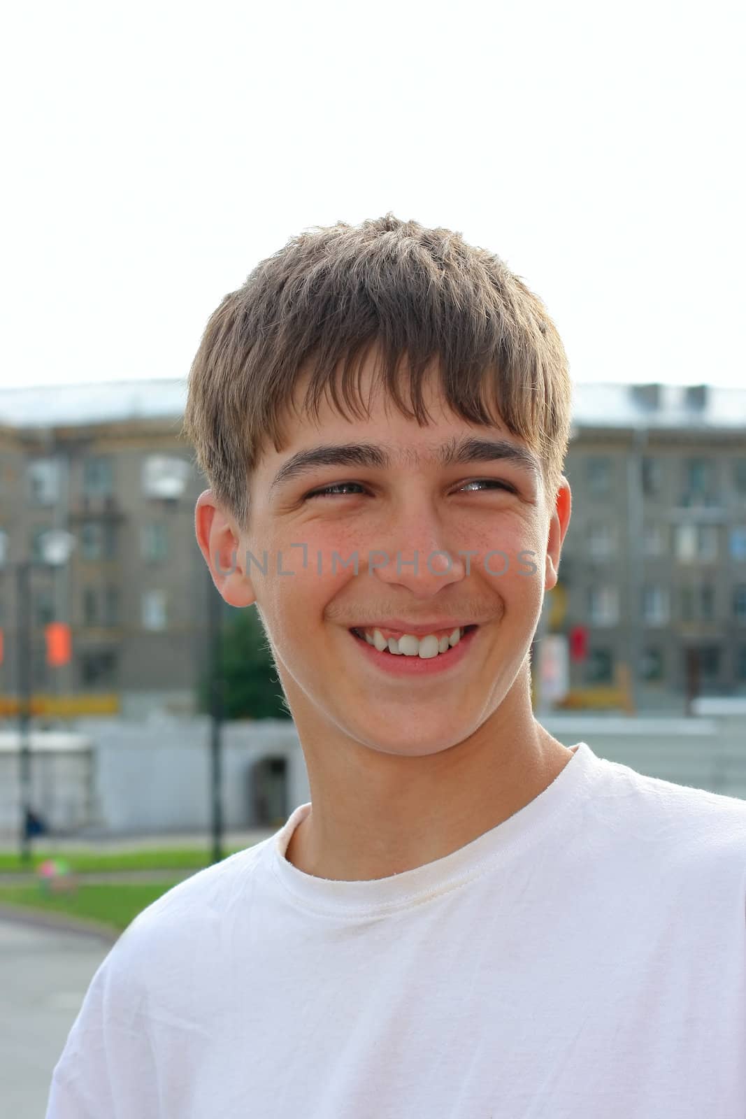 smiling young and happy boy portrait outdoor