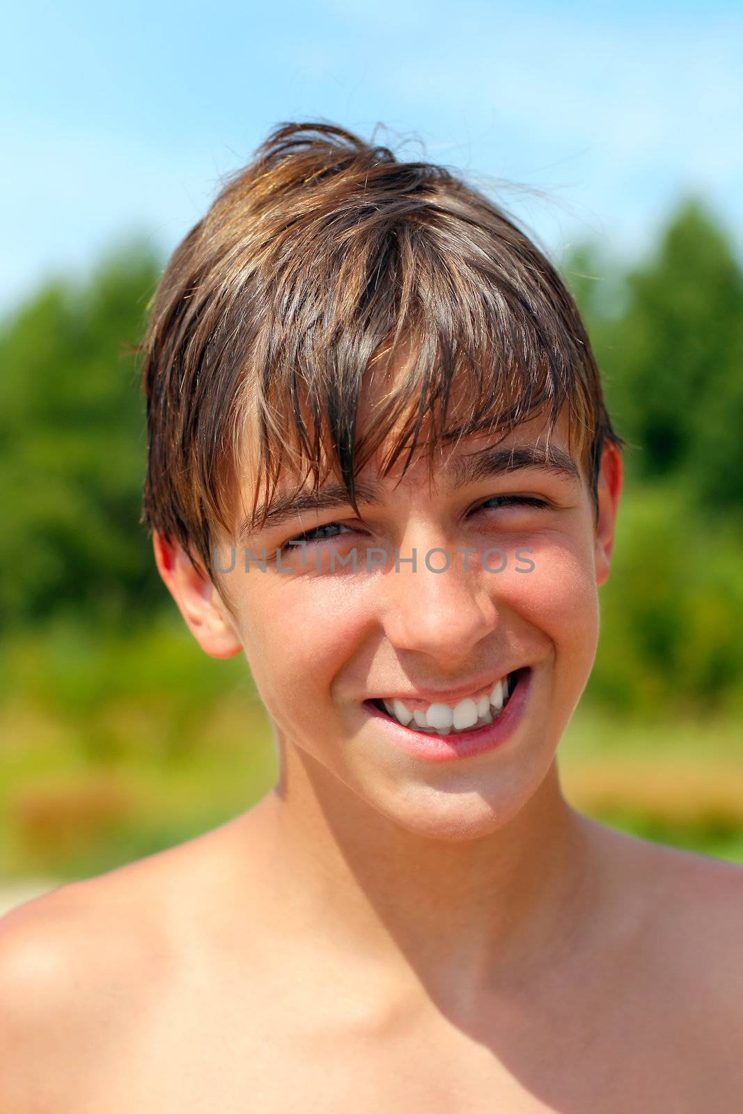 Happy teenager on the beach