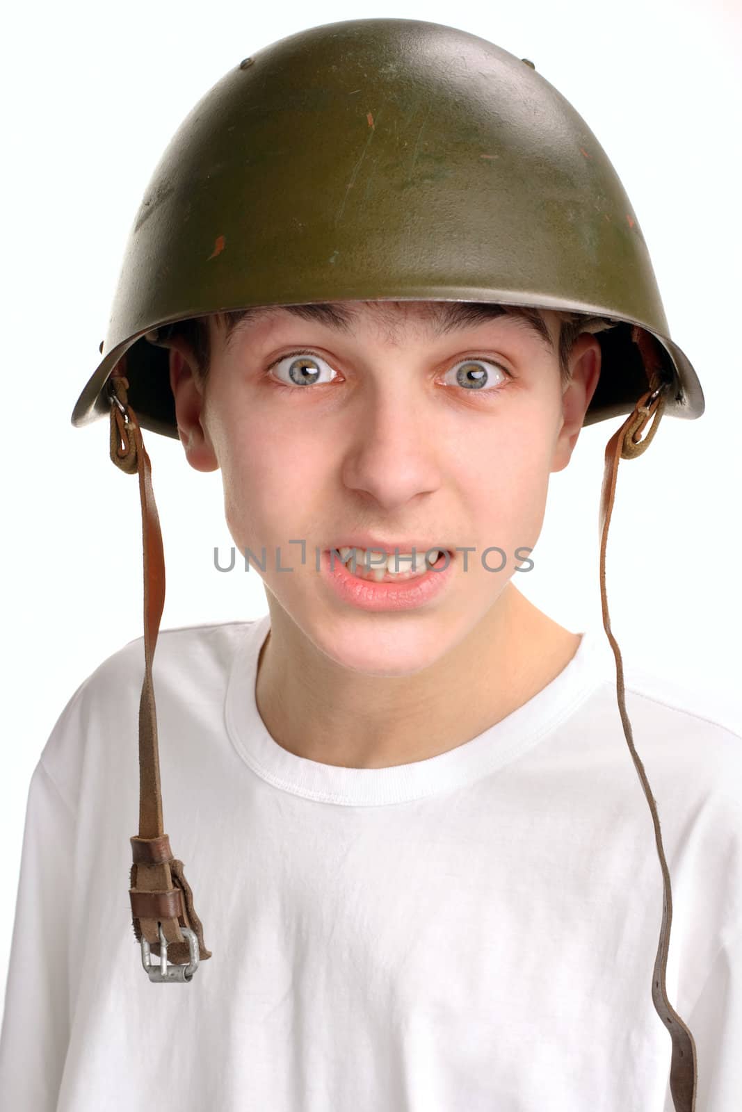 The teenager in a military helmet