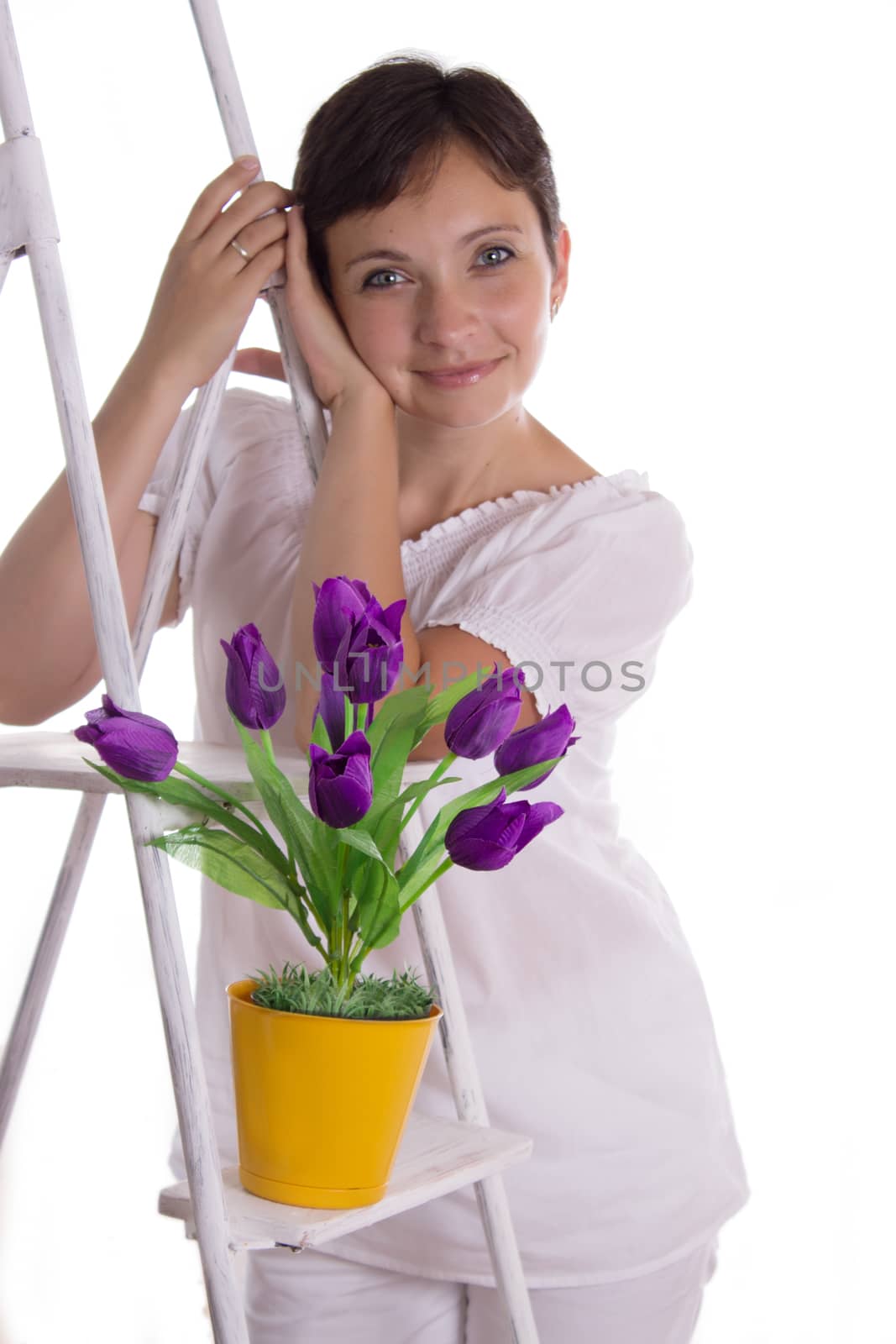 Pretty woman near ladder with tulips by Angel_a