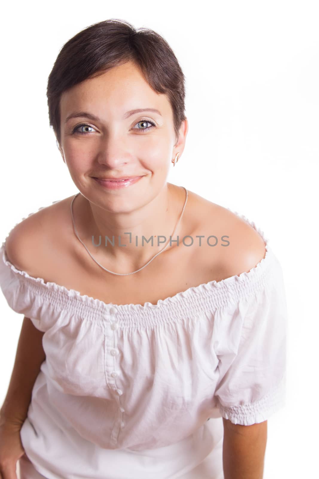 Pretty smiling brunette with short haircut isolated