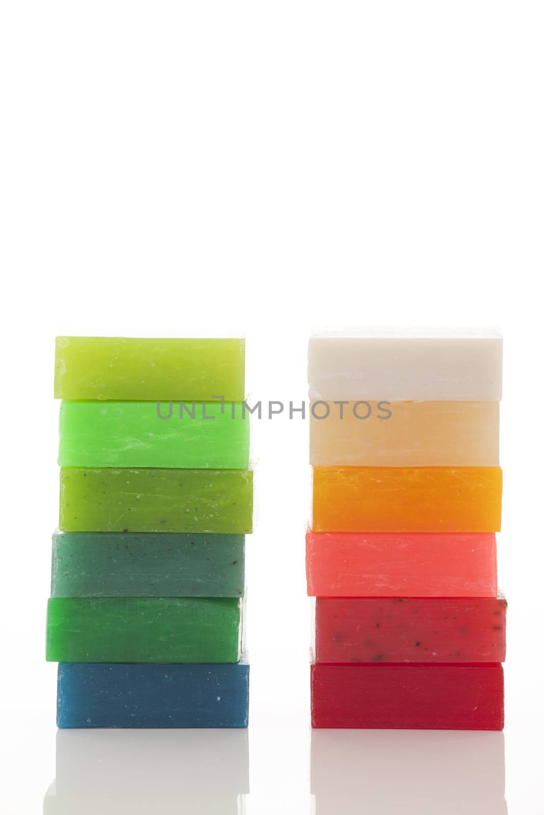 different handmade soaps isolated on white