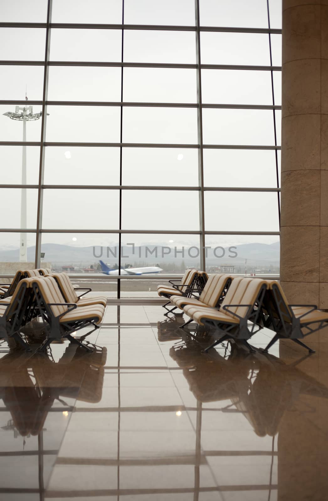 waiting room with seats in airport  by senkaya