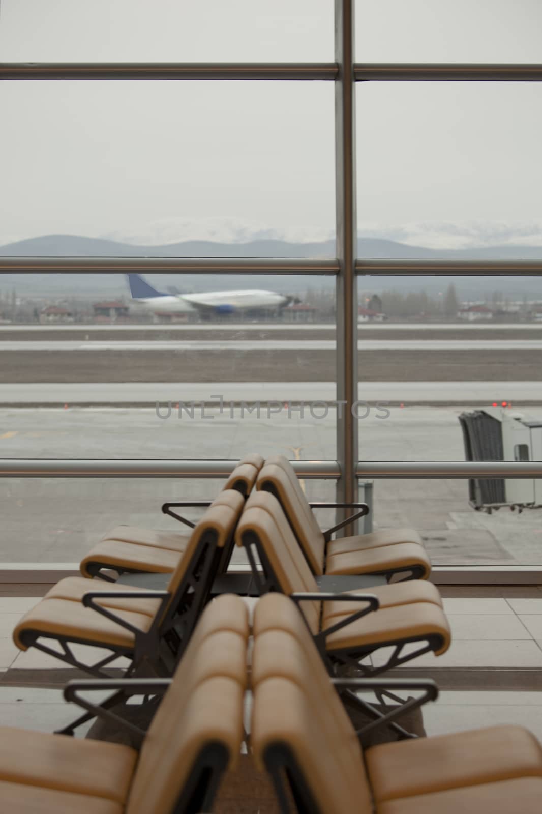 waiting room with seats in airport  by senkaya