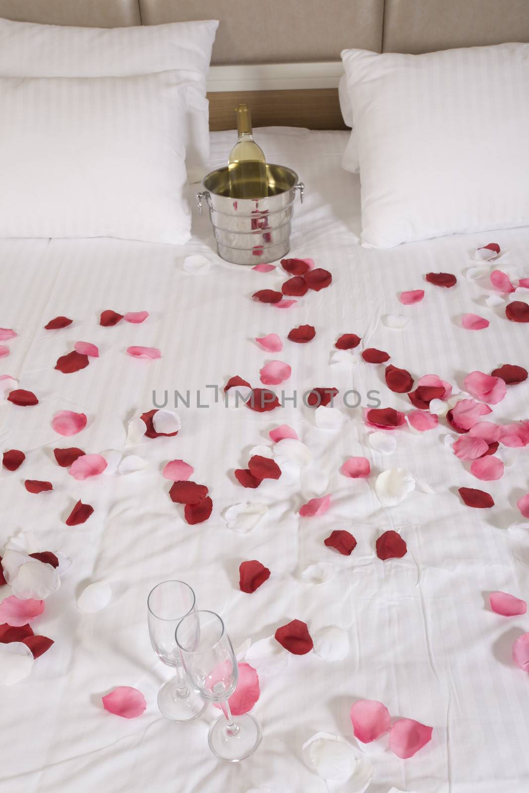 wine in bed to celebrate Valentine's Day at hotel room