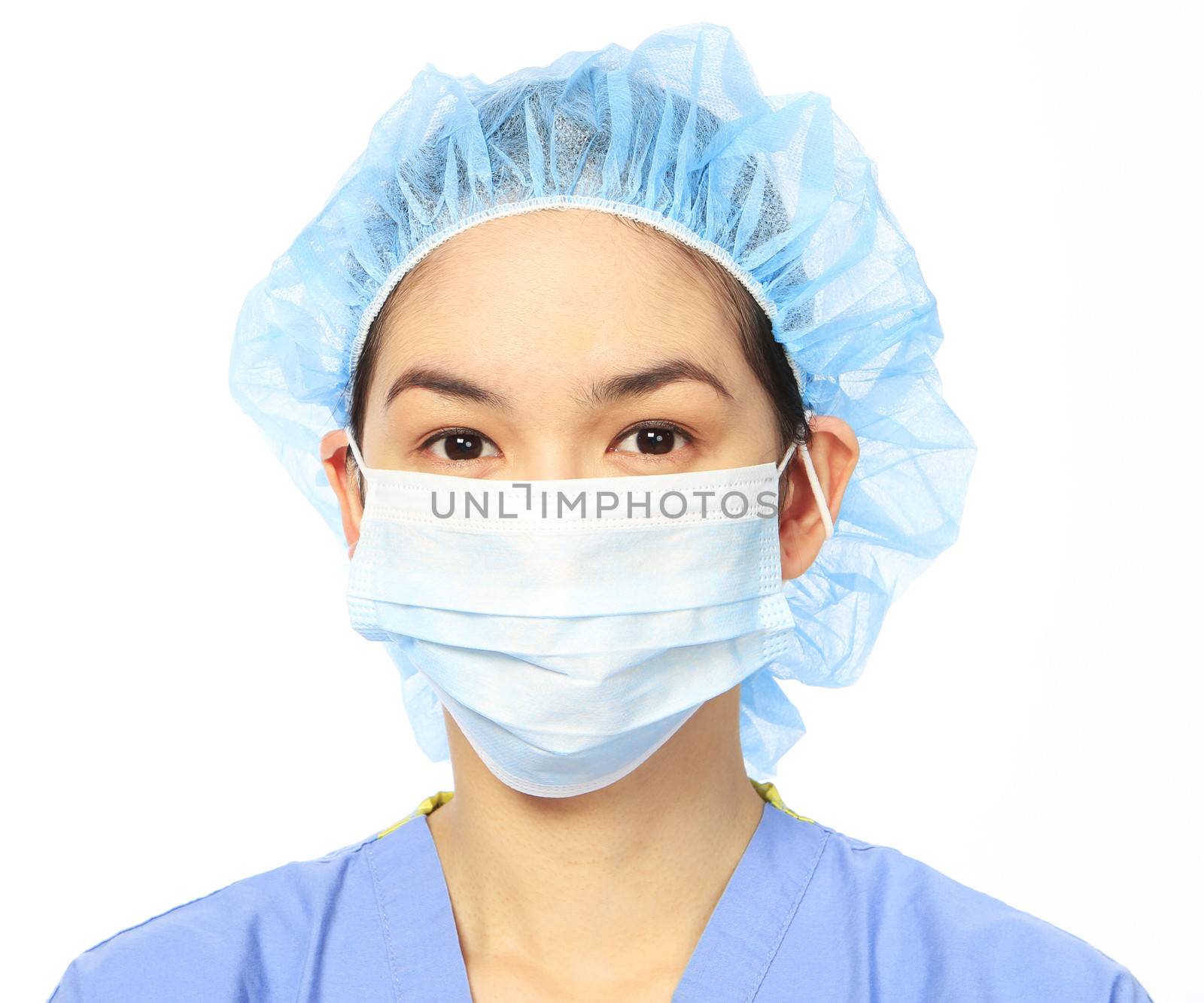 Headshot of a woman in medical attire