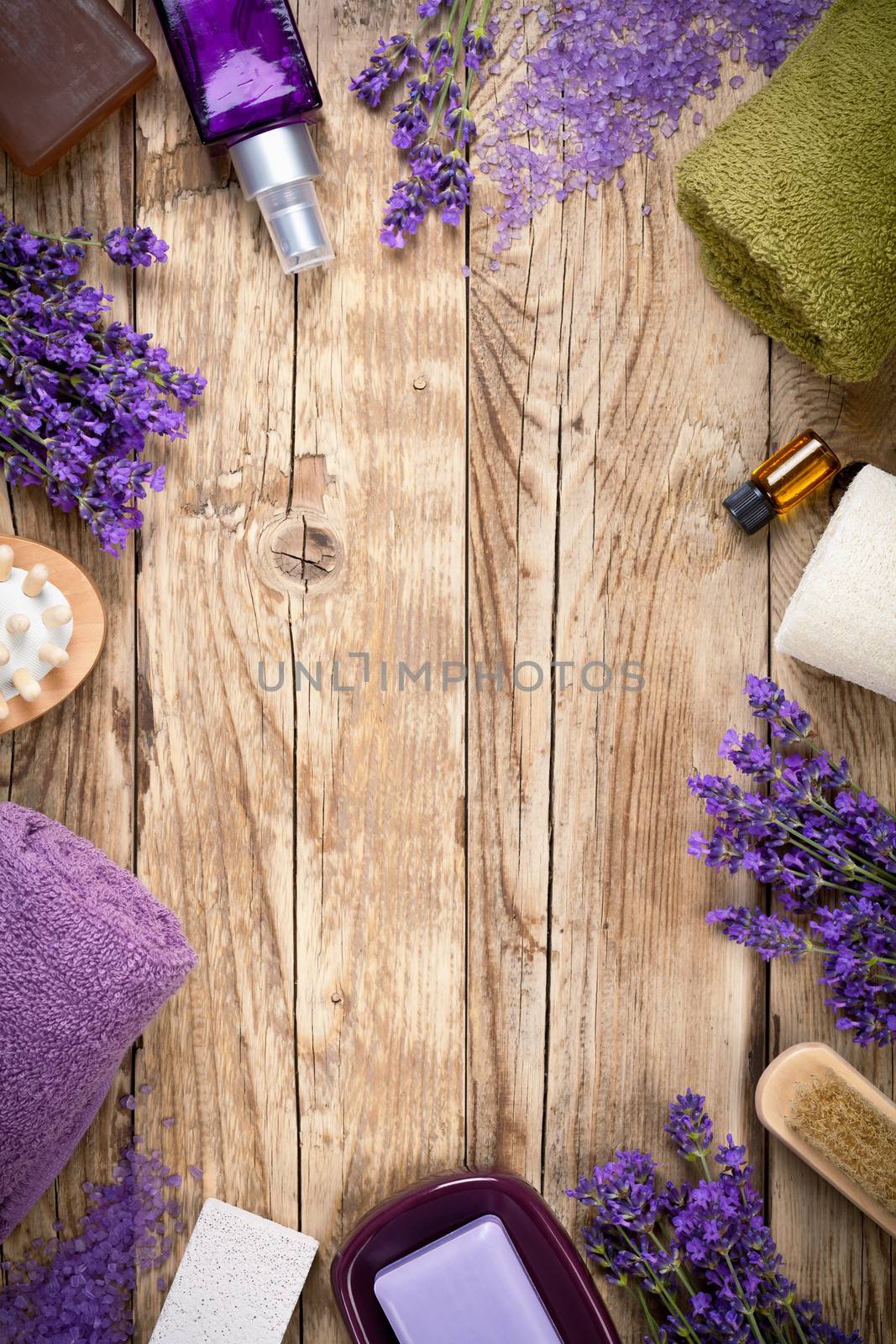 Lavender wellness products on wooden table. Copy space. Top view