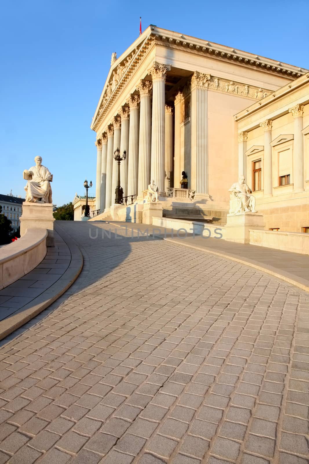 The Austrian Parliament and Athena Fountain in Vienna, Austria