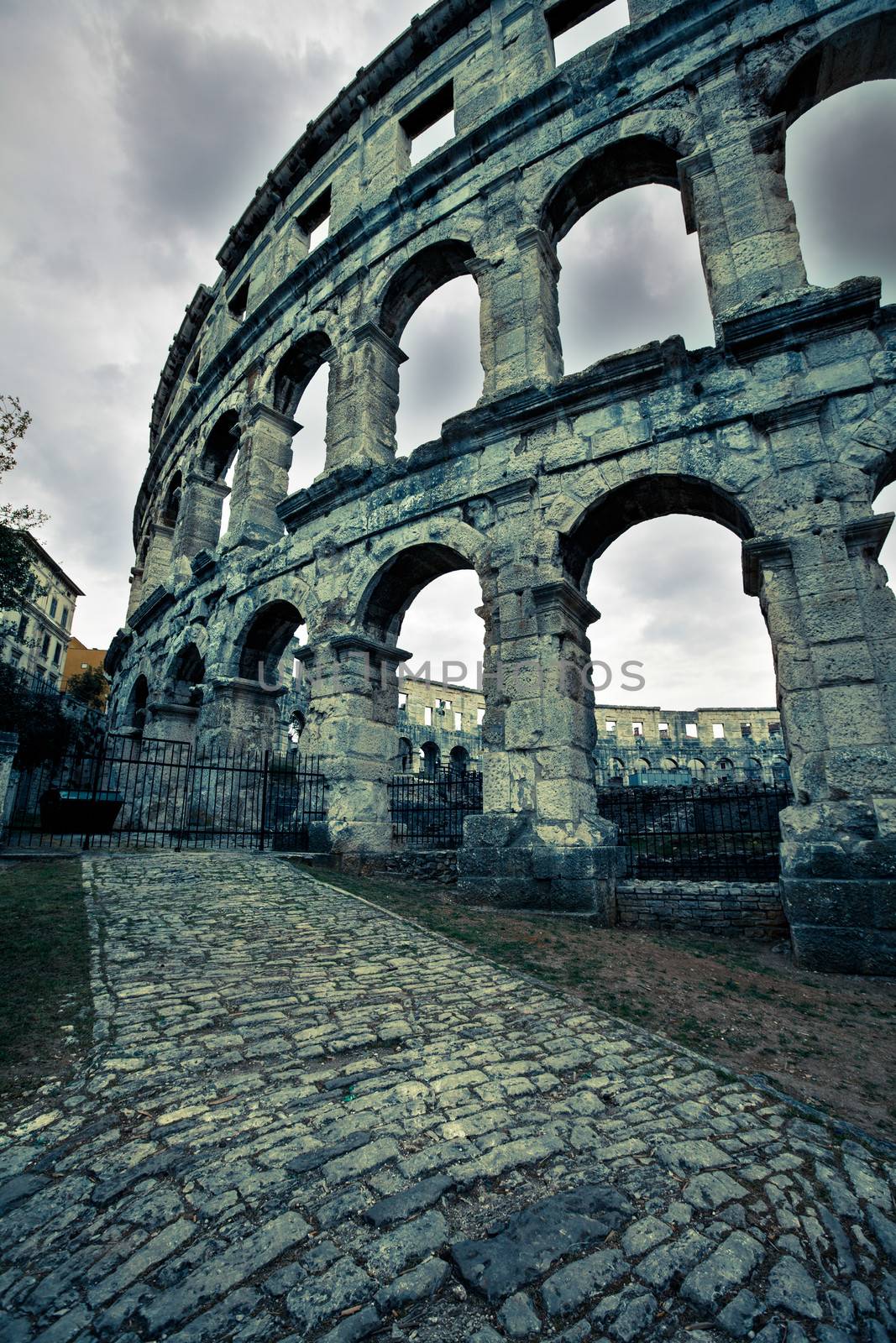 ancient Roman amphitheater coloseum in Pula, Croatia by motorolka